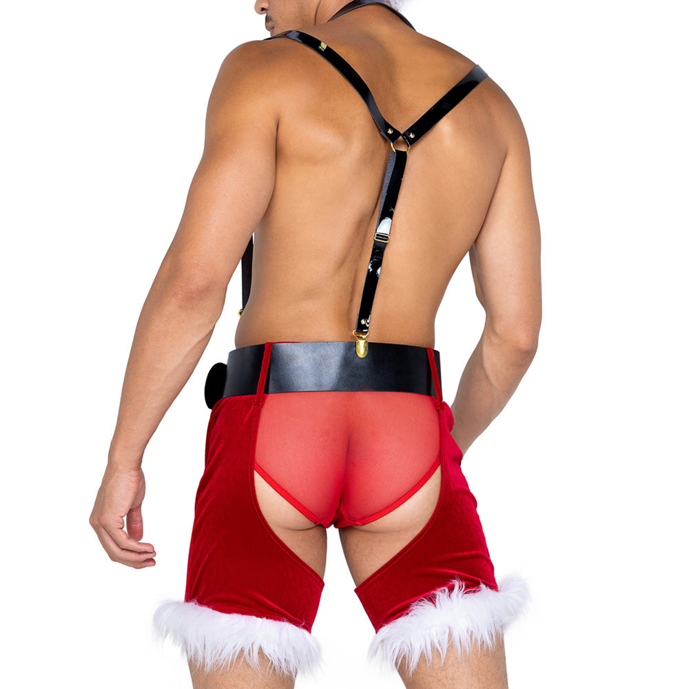 Rear view of a shirtless male model wearing a sexy Saint Nick costume, featuring sheer mesh briefs and backless chaps.
