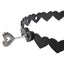 Close up of heart-shaped silver key with a faux leather choker. 
