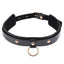 A black faux patent leather choker featuring a dangling gold O-ring.