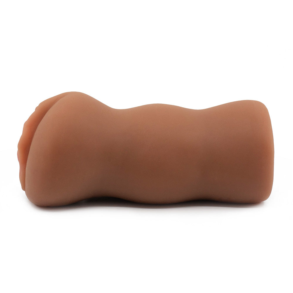 A side view of a realistic pink-lipped ebony pussy stroker with a ribbed texture sits against a white backdrop.