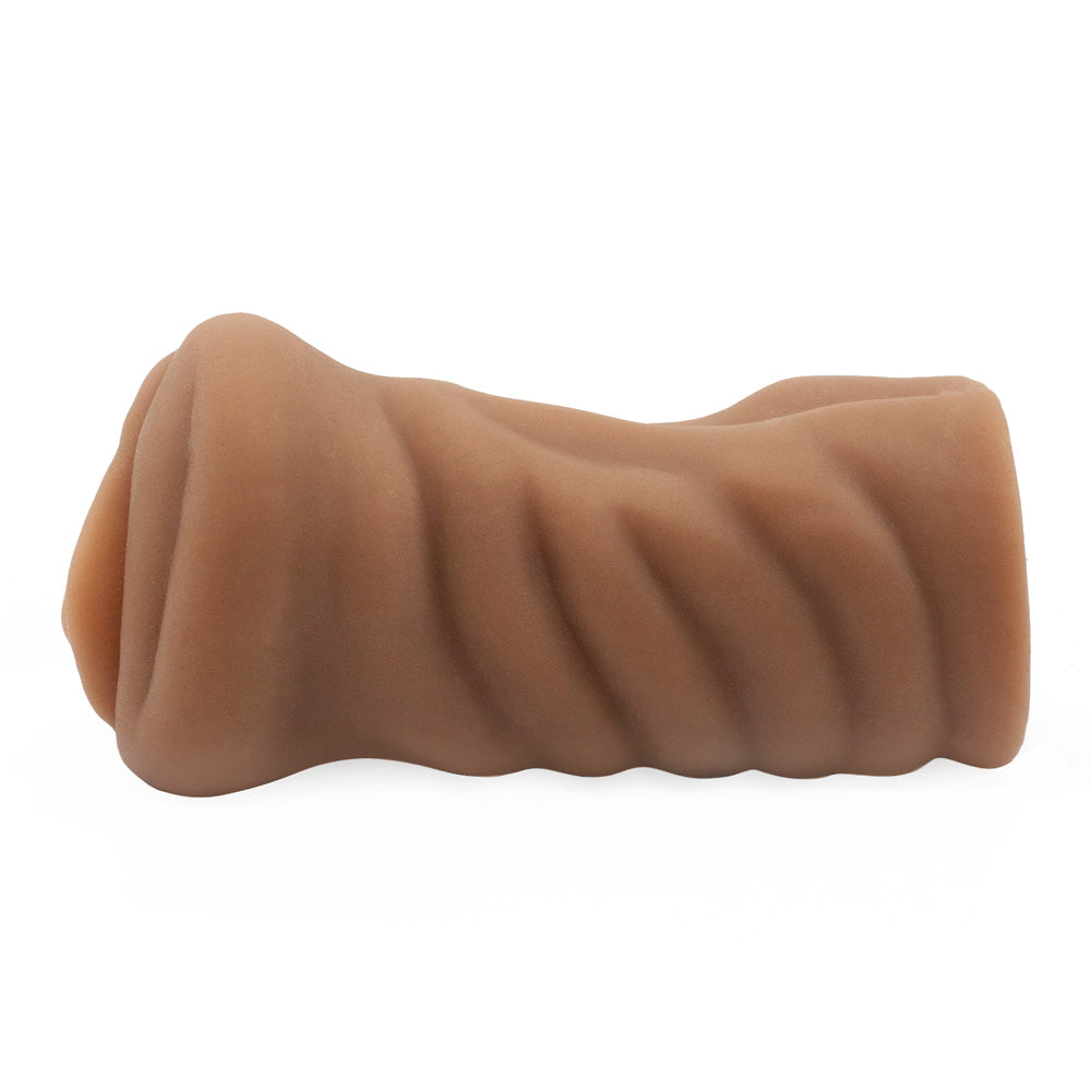 A side view of a realistic brown-lipped pussy stroker with a ribbed texture sits against a white backdrop.