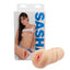 A realistic ribbed pussy stroker sits next to its box featuring brunette porn star Sasha Grey.