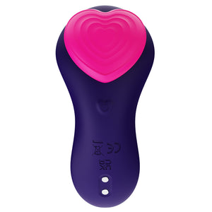 Front view of a silicone panty vibrator with a bulbous design and magnetic charging points at the base handle.