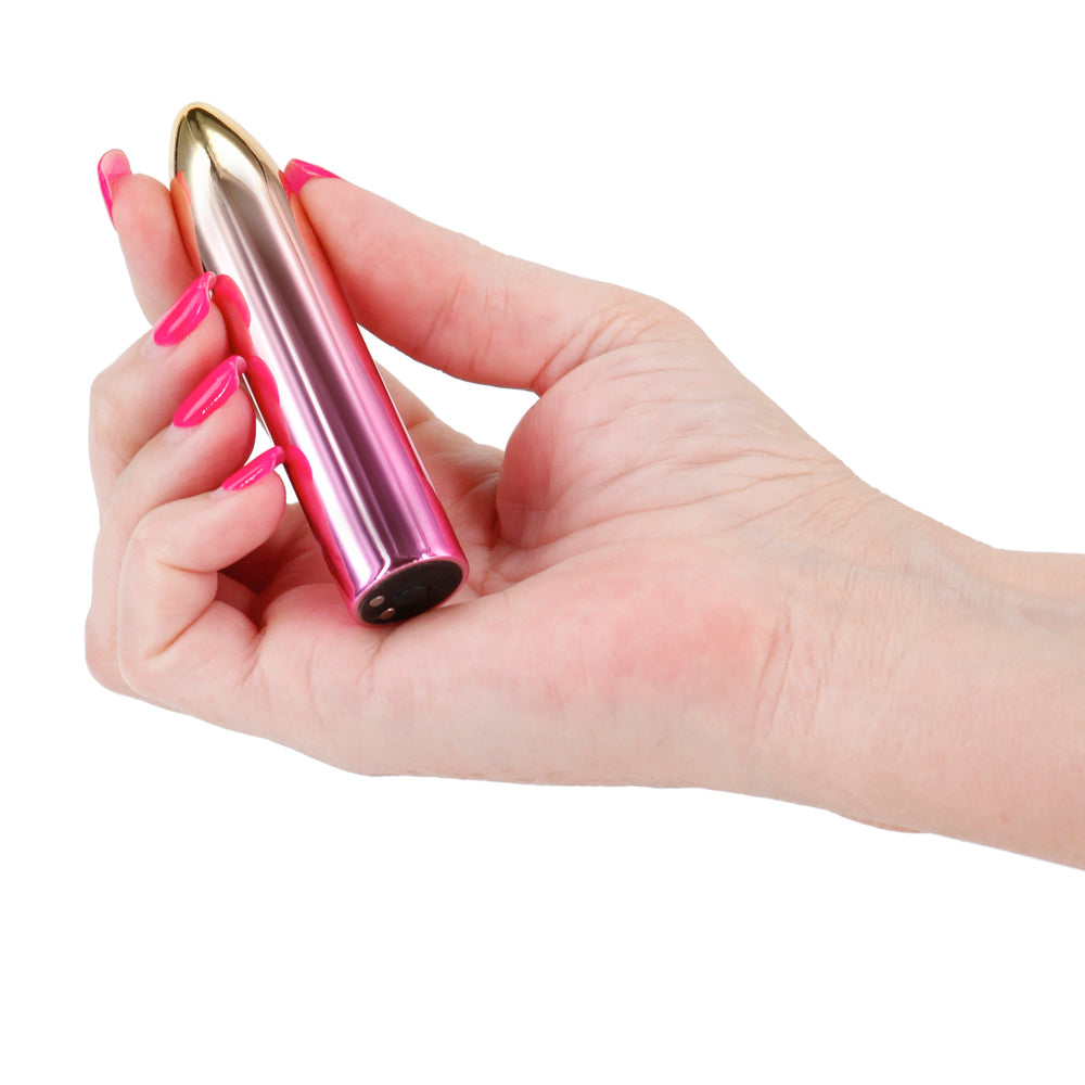 Chroma Rechargeable Tapered Metallic Mini Vibrator has x vibration settings in a tapered metallic body that's compatible w/ all lubricants. Sunrise. On-hand.