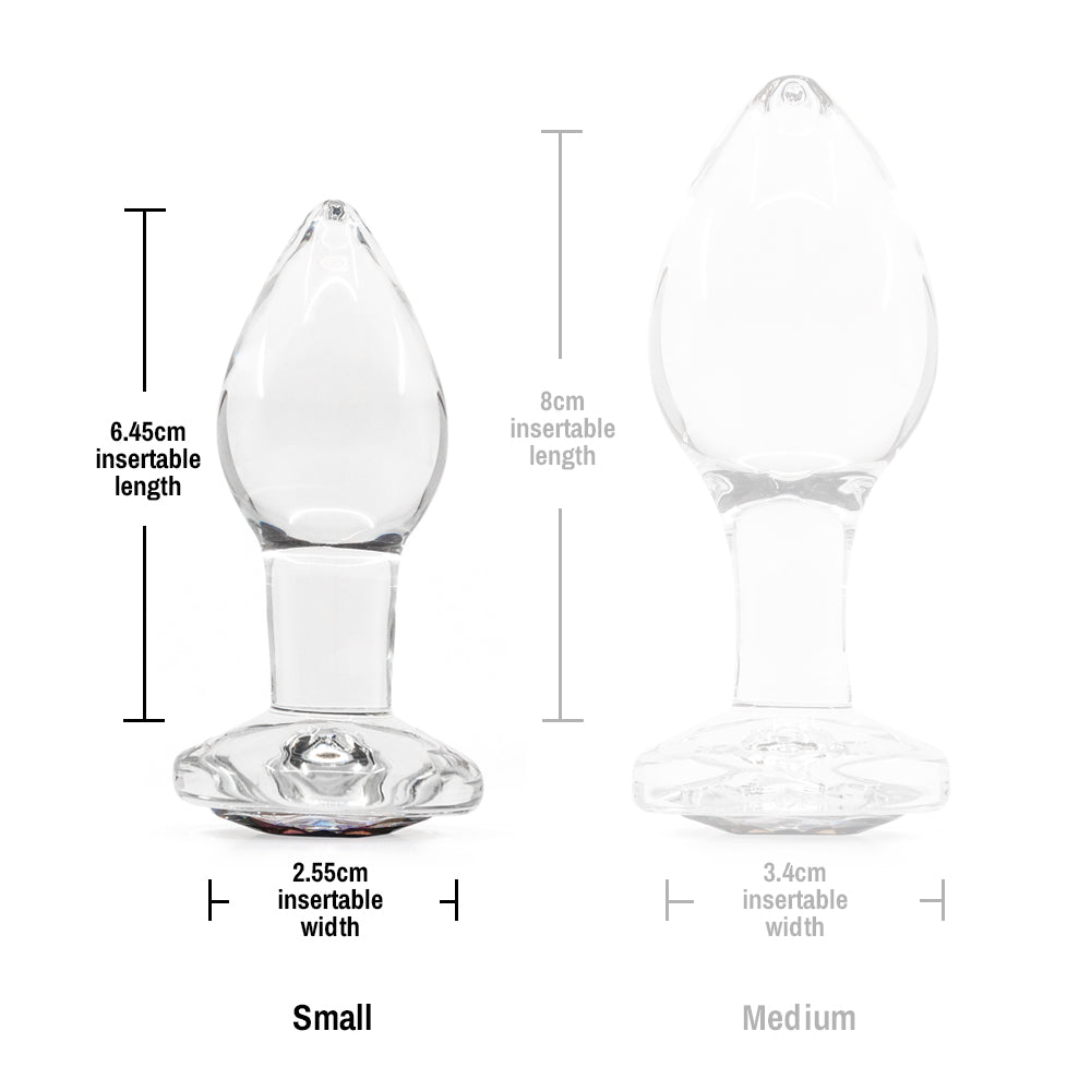  Crystal Desires Glass Butt Plug With Round Gem - Small has a rainbow circular gem base to make your butt look glamorous! Compatible w/ all lubricants & temperature play. Size chart.