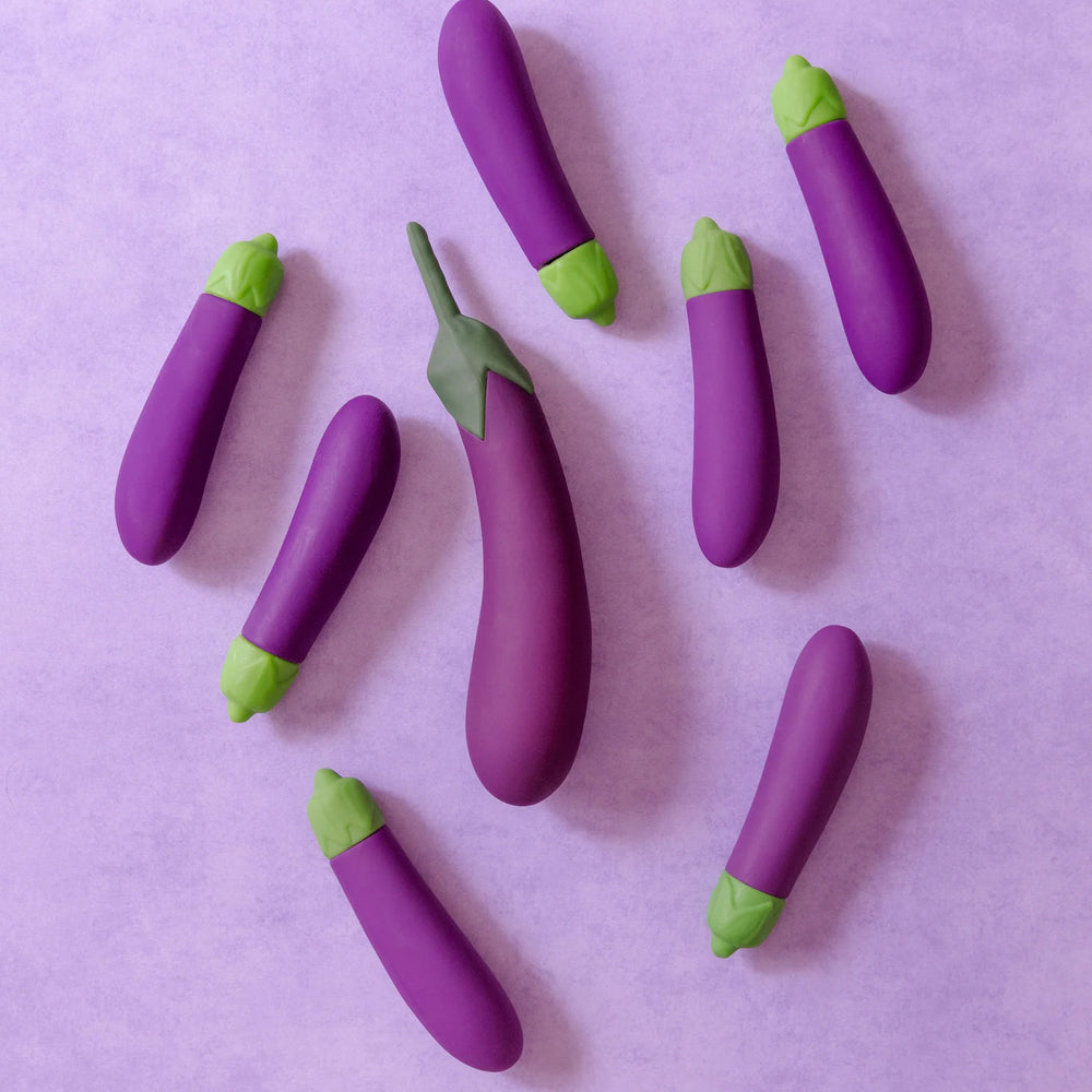 Emojibator Eggplant Emoji XL Rechargeable Silicone Vibrator has 10 vibration modes packed into a large bulbous body shaped like the iconic eggplant emoji to enhance self-pleasure. Editorial. (3)