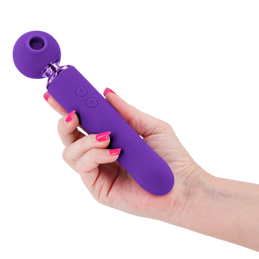 Revel Fae Clitoral Air Pulse & Thrusting Wand Vibrator's head has 10 modes of contactless clitoral suction & throbbing vibration + 10 thrusting modes in the handle. Purple. On-hand.
