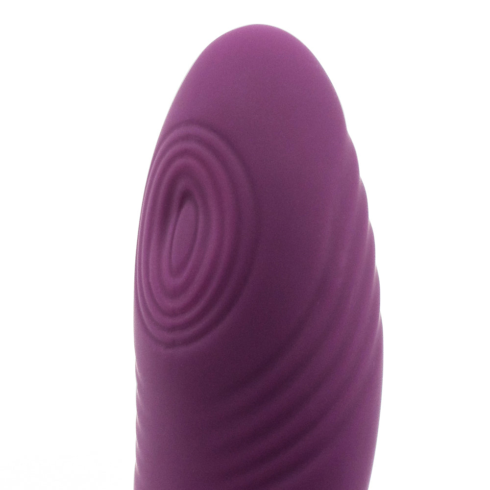 Sexyland Pamper G-Spot Thumping & Clitoral Suction Stimulator has a 10-mode oscillating G-spot pad in a ribbed insertable head & a flexible neck to align 10 clitoral suction modes in the hollow chamber. Purple. G-spot pad.