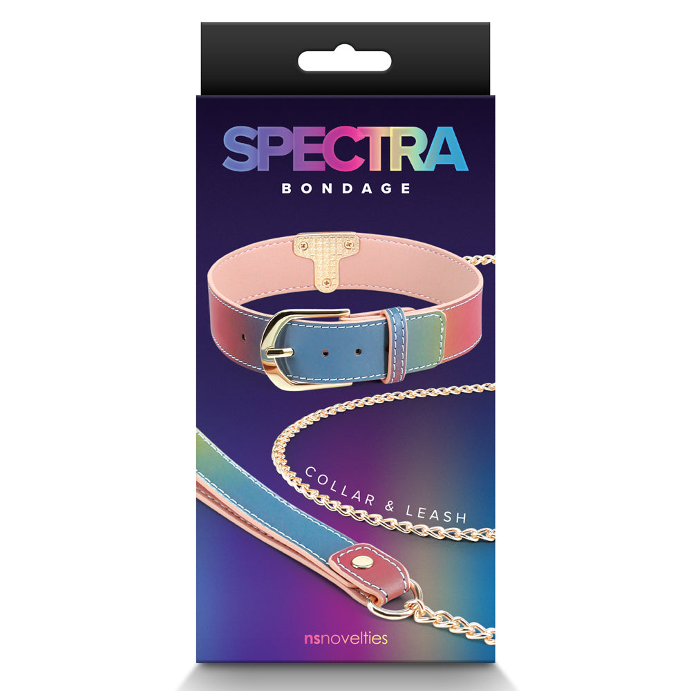 Spectra Bondage Rainbow Faux Leather Collar & Chain Leash includes a metal chain leash & a faux leather collar in a rainbow gradient w/ gorgeous gold hardware. Package.