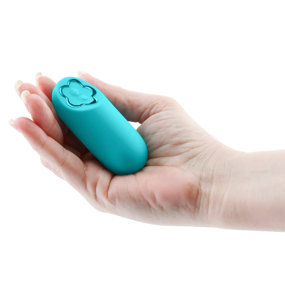  Sugar Pop Harmony Mini Silicone Bullet Vibrator has 8 vibration modes packed into a compact, travel-friendly body & has a contoured, ergonomic grip. Teal. On-hand.