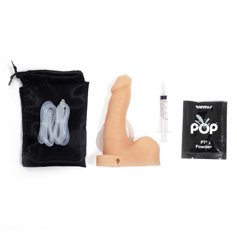 Tantus Pop n' Play 5" Squirting Silicone Packer Dildo is soft enough to wear under clothes & firm enough for play. Includes 3 tips, tubes & a handheld syringe. Accessories.
