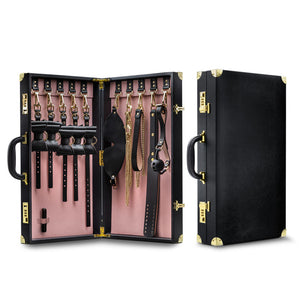 Temptasia Safe Word Luxury Vegan Bondage Kit includes wrist/ankle cuffs, a collar w/ chain leash, blindfold, a ball gag, a double-layered slapper & a bullet vibrator for kinky fun!