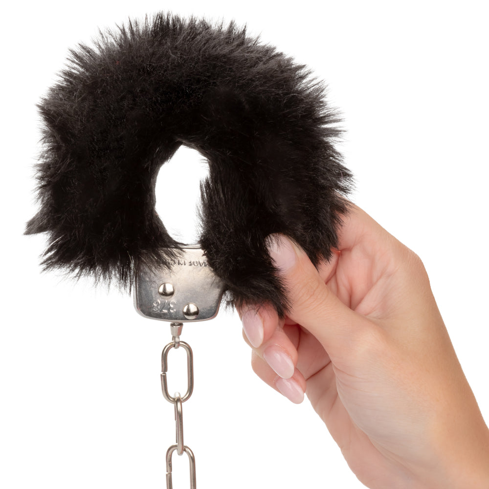 Ultra Fluffy Furry Lockable Metal Handcuffs are covered in luxuriously soft faux fur that's removable for more intense BDSM play. Black. On-hand.