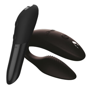 We-Vibe's Tango X vibrating bullet and Sync 2 couples vibrator stand next to each other in limited-edition black silicone.