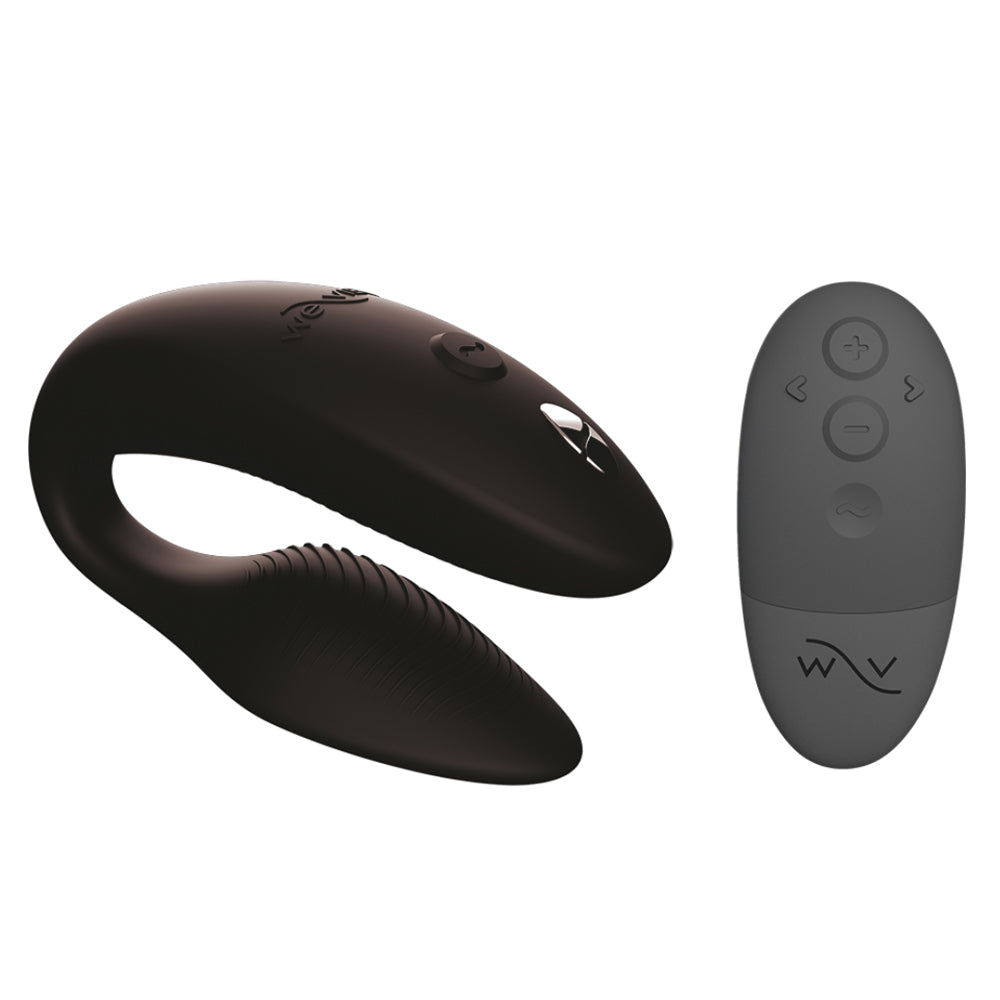 The We-Vibe Sync 2 dual vibrator stands next to its remote control on a white background.