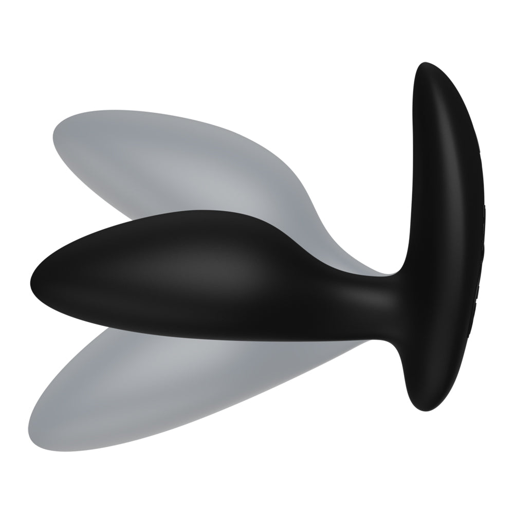 Side view of a small, black, vibrating butt plug from We-Vibe showcases its flexible neck against a white background.