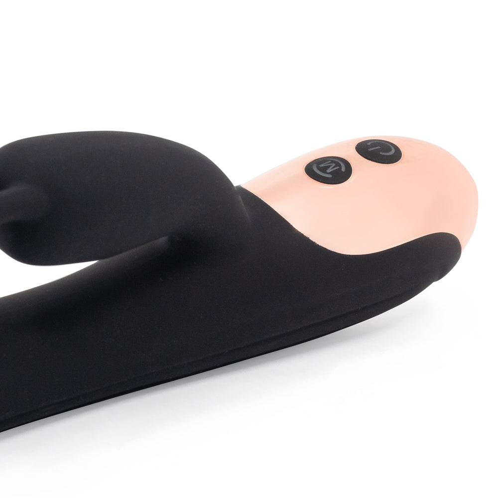 This rabbit vibrator has a ridged texture for more stimulation + independently controlled dual motors for your perfect combo of internal & external pleasure. Black. Control buttons.