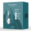 A box for the Womanizer Liberty 2 Travel-Ready Clitoral Stimulator in teal stands against a white background