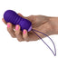 Slay™ - #ThrustMe - remote control mini massager has 10 thrusting modes in its ribbed silicone body to stimulate your insides like never before. Rechargeable and waterproof. Purple, massager in hand for size comparison