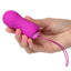 Slay™ - #SpinMe - remote control textured toy has 10 vibration & rotation modes to stimulate your insides like never before. Waterproof & rechargeable for your convenience. Pink, in hand for size comparison
