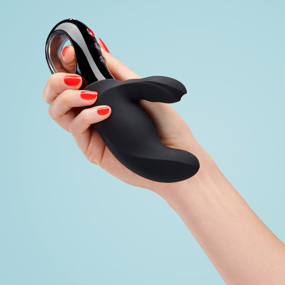 Fun Factory - Miss Bi Black Line Dual Vibrator - technologically advanced rabbit vibrator has dual motors with 6 vibration speeds & 6 patterns for wicked clitoral & G-spot stimulation, waterproof and with travel lock - Black. In hand image for size comparison