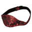 Scandal® - Hidden Pleasure Ball Gag -wide front panel that hides the silicone ball gag on the wearer's side in Scandal's luxe signature red & black brocade design.