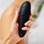 Womanizer Classic 2 - clitoral stimulator has 10 Pleasure Air Technology modes. rechargeable. Black, in hand
