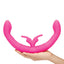 Hand model holding Pink Together Double-Ended Couples G-Spot & Clitoral Rabbit Vibrator for Lesbians
