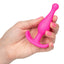 Booty Call Booty Rocker Anal Plug - round bead tip for smooth insertion & a curved rocking base that doubles as a retrieval handle. Pink-on hand.