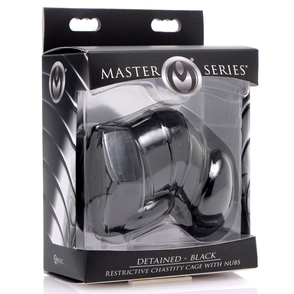 Master Series Detained - Restrictive Chastity Cage - TPR chastity device has separate shaft & testicle openings to keep his package in check. box