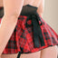 Fantasy Lingerie Play Hands-On Learning Schoolgirl Costume Set has a collared halter teddy w/ necktie ribbon, removable garters & a tie-back skirt in red plaid. (4)