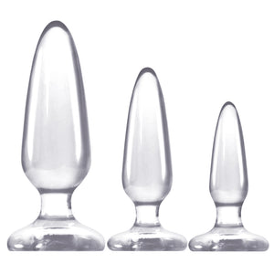 The Jelly Rancher Anal Plug Trainer Kit includes 3 tapered butt plugs in graduating sizes with flared suction cup bases, perfect for anal beginners. Clear.