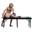 Master Series Extreme Bondage & Milking Massage Bed includes cuffs & is comfortably padded. It has cutouts for the face, hips & genitals for milking & restraint play. Editorial.