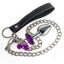 Metal Gem Butt Plug With Bells & Chain Leash - Small has detachable bells & chain leash for uniquely stimulating backdoor fun that looks as good as it feels. Violet with chain leash.