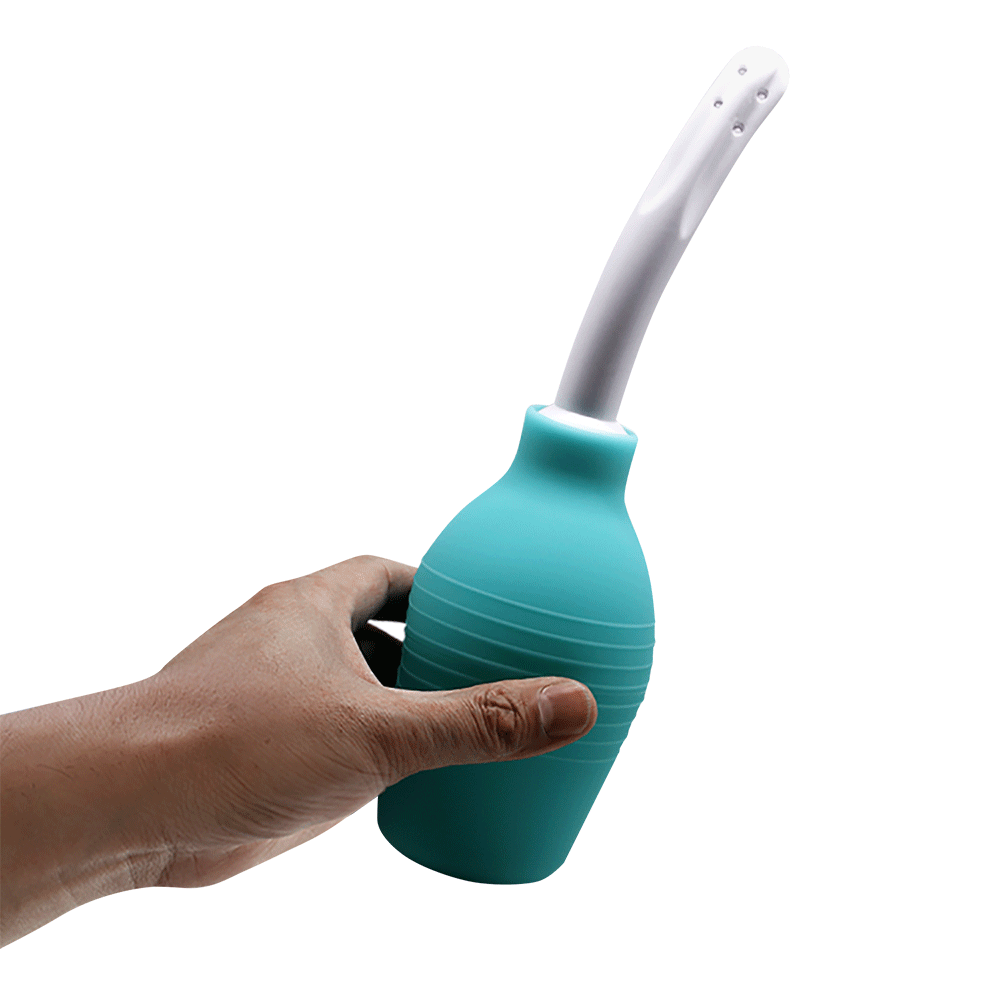 Mr Play - Super Power Anal Douche - 310ml anal douche has a multi-directional spray in a flexible nozzle & a flat-bottomed silicone bulb. in action