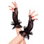 Music Legs Fingerless Fishnet Wrist Gloves With Lace Ruffle have lacy ruffled cuffs that look great with 80s glam-inspired looks, costumes & lingerie.
