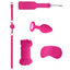 The Ouch! Introductory Bondage Kit #5 has 10m of Japanese silk rope, spanking paddle, satin eye mask, jewel-ended anal plug & a breathable ball gag. Pink.