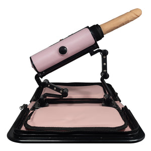 This pretty pink handbag is the most discreet sex machine on the market w/ 2-inch deep thrusting in 3 speeds, 7 vibration settings & a warming mode. Angled up.