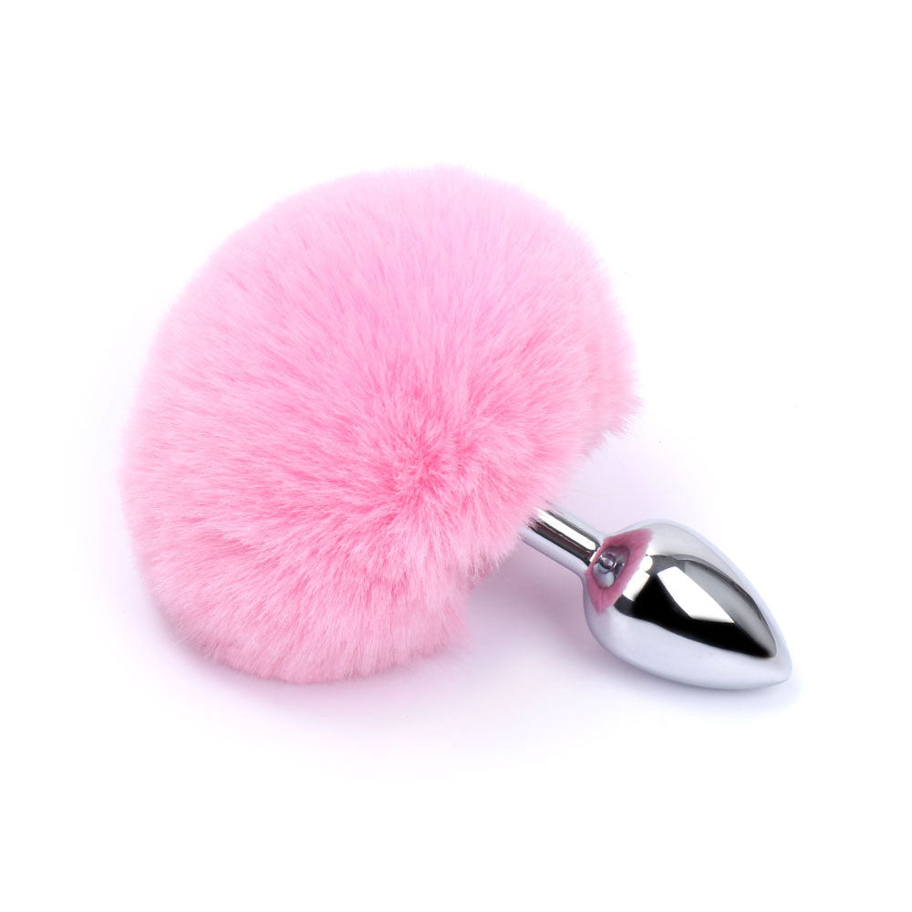 Rabbit Tail Metal Butt Plug has a cute fluffy bunny tail w/ a tapered tip for comfortable insertion & a seamless finish that's compatible w/ all lubricants. Pink.