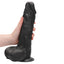  RealRock 10" Realistic Dildo With Balls & Suction Cup has realistic sculpted details like a phallic head & veiny shaft in velvety-soft skin like material. Black-on hand.