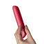 Rocks-Off SugarBoo Rechargeable Waterproof 10-Speed Vibrator has 10 vibration modes in its tapered tip for broad or precise pleasure. Magnetically rechargeable for your convenience. Cool coral-on hand.