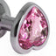  Seamless Metal Butt Plug With Heart Gem has a heart-shaped gem base that makes your butt look cute & glamorous while the material holds heat/cold for temperature play. Pink.