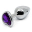  Seamless Metal Butt Plug With Heart Gem features a heart-shaped gem base that makes your booty look cute & glamorous! Also holds heat & cold for temperature play. Purple.
