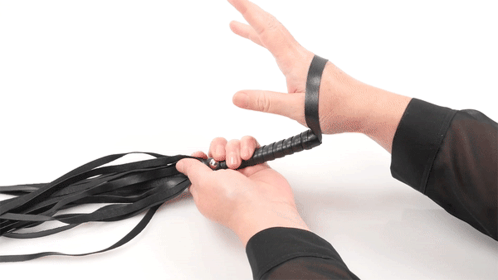 Sex & Mischief Intro to S&M Kit With Cuffs, Flogger & Blindfold. This beginner-friendly BDSM kit includes fluffy handcuffs, a flogger & a soft black satin blindfold for all your sadomasochism needs. GIF.