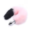 Short Fox Tail Metal Anal Plug Pink/Black. This beginner-friendly petite metal anal plug for furries has a fluffy pink fox tail attached with a black-dipped end for a cute look.