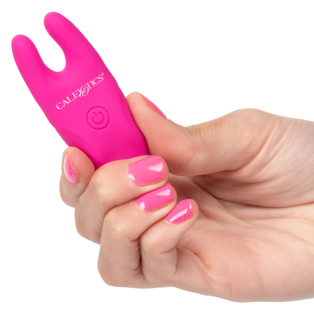 These wireless nipple clamps pinch you w/ pleasure & have 12 independently controlled vibration modes that you can activate with or w/out the remote. Pink - hand
