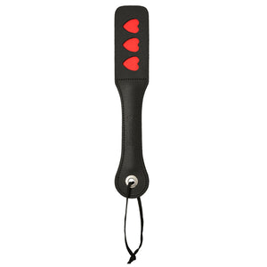 Sportsheets Leather Triple Heart Impression Paddle is engraved w/ 3 red hearts that leave impressions on your sub's skin to show just how much you love them. (3)