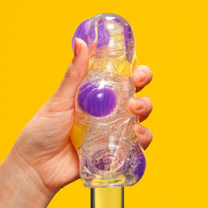 Tenga Bobble Contrast Firm & Soft Masturbator combines firm & soft elastomers for dynamic pleasure as the textured orbs bounce & roll around you for unique sensations. (3)