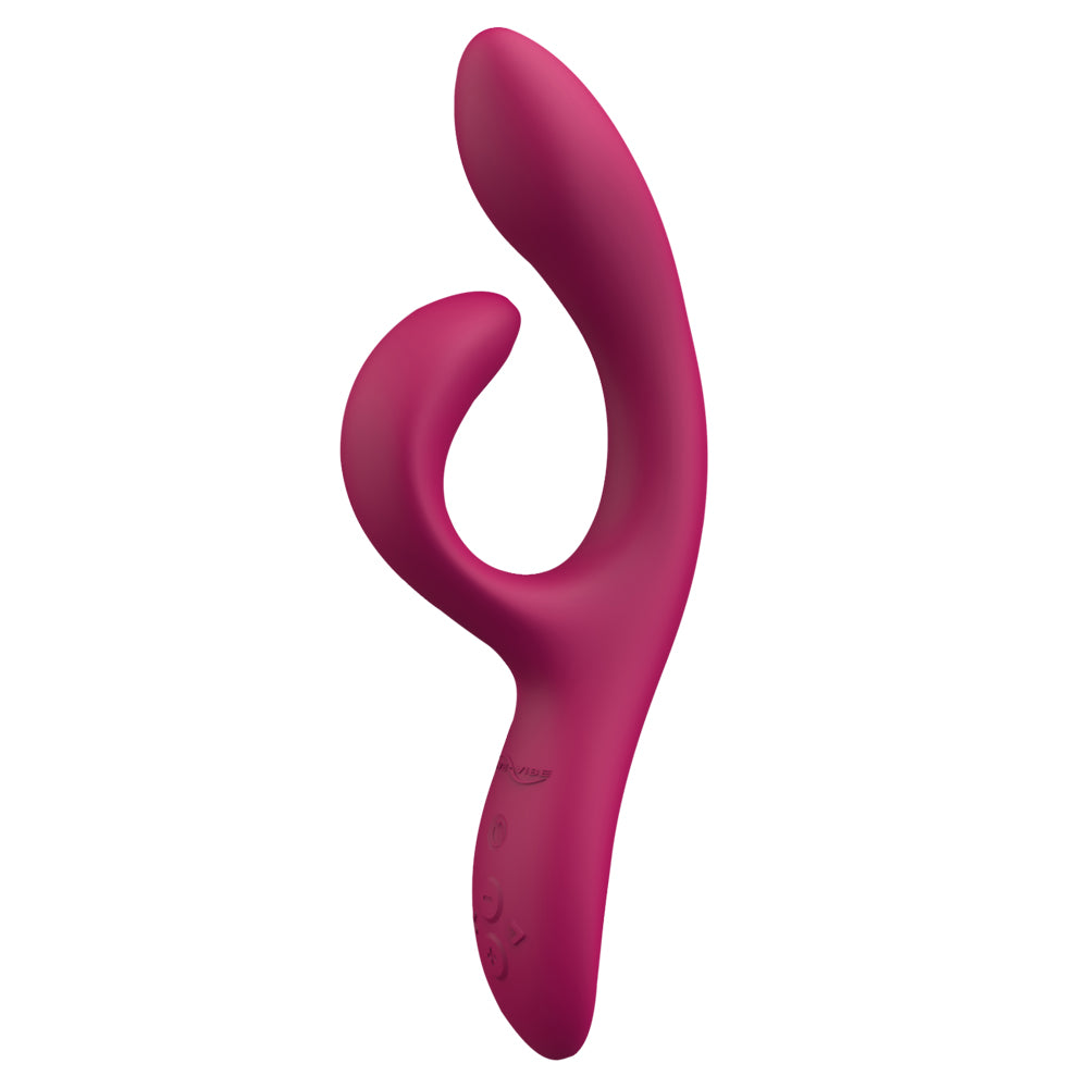 A burgundy-pink We-Vibe rabbit vibrator with a curved G-spot head and clitoral arm stands against a white background.