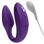 We-Vibe Sync 2 App-Compatible Couples Vibrator With Remote stimulates the wearer's clitoris + G-spot while the flat underside leaves room for a penetrating partner. Purple. Magnetic charging. 